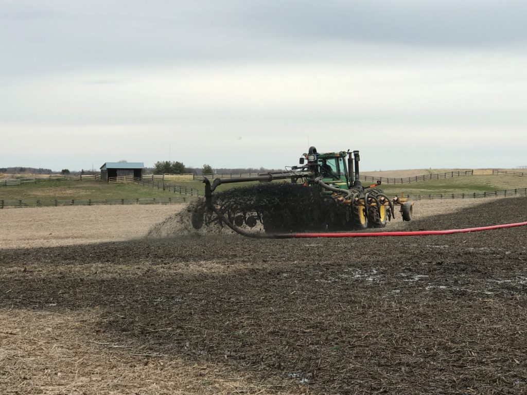 manure being applied prior to corn planting in 2020
