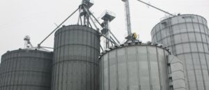 Image shows grain bins and a grain dryer on an Ontario farm