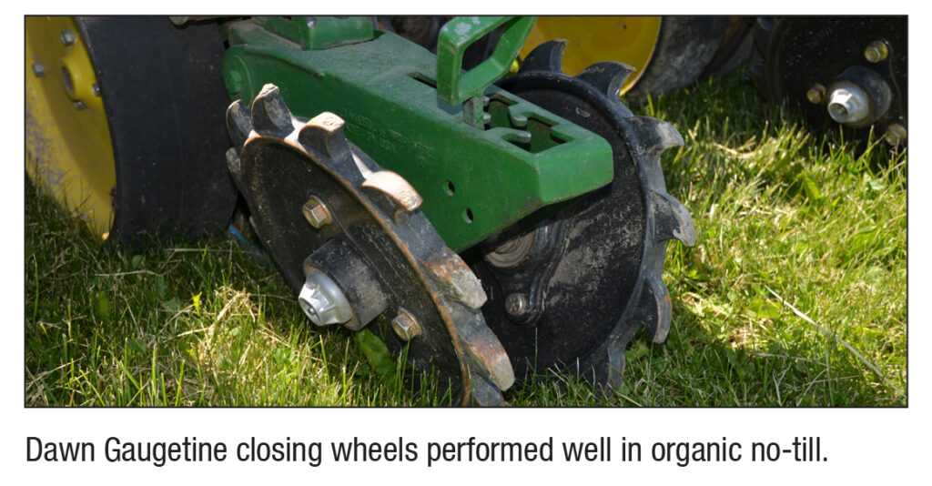closing wheels at the back of a planter