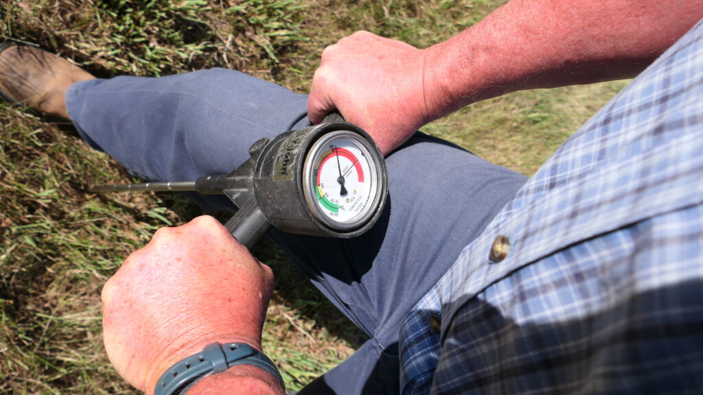 Using tile probes and compaction meters to find compacted soils.