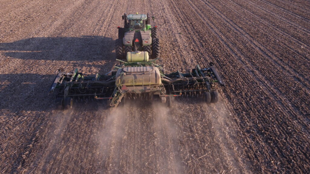 Seed drills with well-maintained coulters and closing systems to plant directly behind the combine harvesting soybeans, where the residue was evenly spread.
